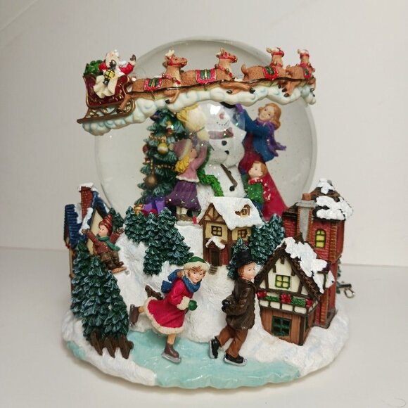 Christmas Musical Revolving Snow Globe with Lights Here Comes Santa Clause Video - Picture 1 of 12